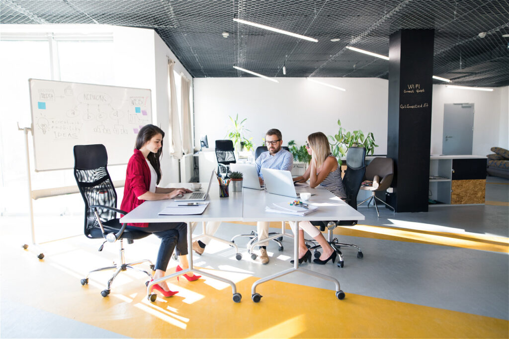 three-business-people-in-the-office-talking-togeth-2023-11-27-05-31-22-utc